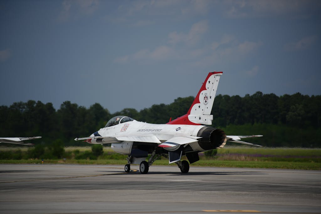 Jets vs Bengals USAF Thunderbird F-16 fighter jet positioned on the runway at Charleston, SC airport.